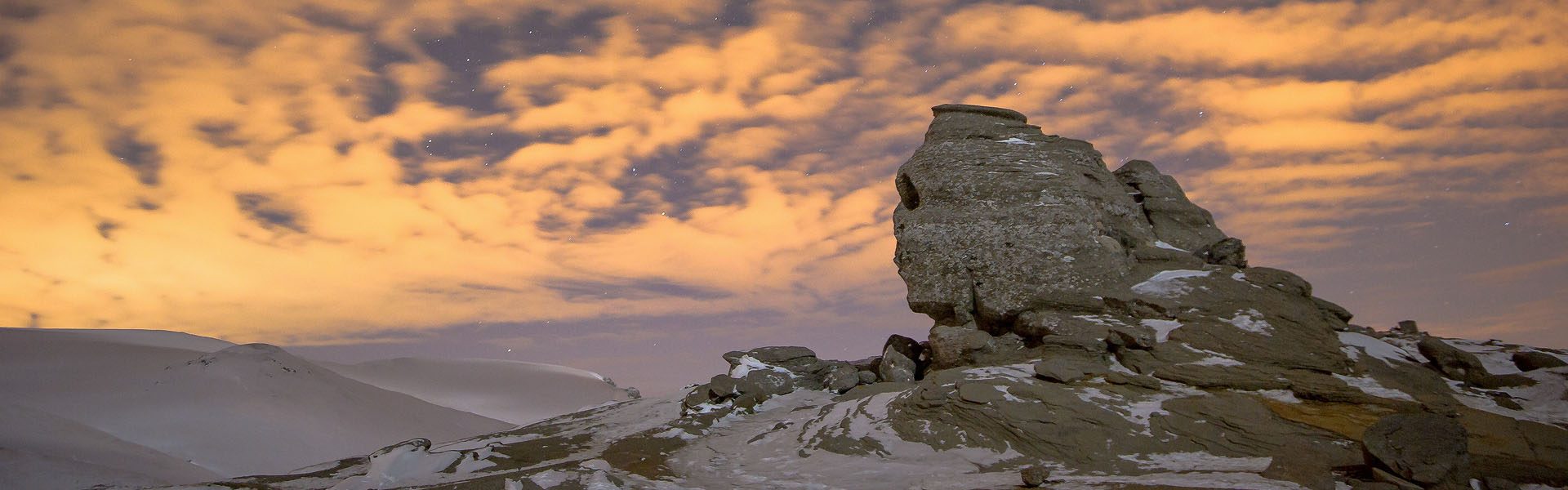 The Sphinx rock formation on the Bucegi plateau at dusk